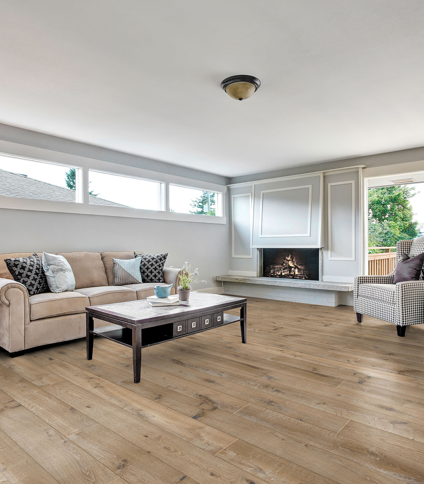 Moorea light brown wide plank hardwood — room view